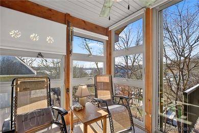 This stunning lakefront home in Four Seasons offers 75 feet of on Seasons Ridge At Four Seasons in Missouri - for sale on GolfHomes.com, golf home, golf lot