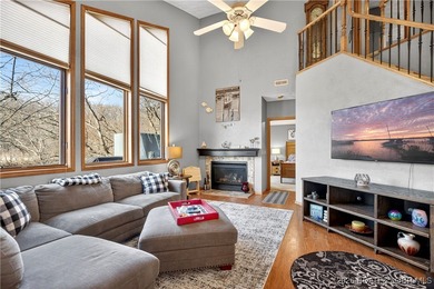 This stunning lakefront home in Four Seasons offers 75 feet of on Seasons Ridge At Four Seasons in Missouri - for sale on GolfHomes.com, golf home, golf lot