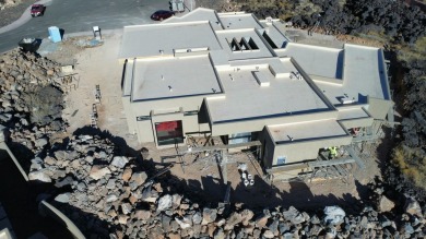 New Custom home nestled in the Lava field in ENTRADA's gated on Entrada at Snow Canyon in Utah - for sale on GolfHomes.com, golf home, golf lot