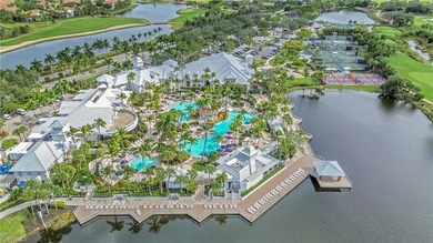 Gorgeous, spacious end unit with views of trees and water on The Rookery At Marco in Florida - for sale on GolfHomes.com, golf home, golf lot