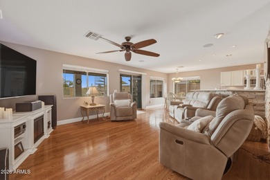 Perched against the iconic Superstition and Dinosaur Mountains on Gold Canyon Golf Resort - Sidewinder in Arizona - for sale on GolfHomes.com, golf home, golf lot