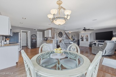 Perched against the iconic Superstition and Dinosaur Mountains on Gold Canyon Golf Resort - Sidewinder in Arizona - for sale on GolfHomes.com, golf home, golf lot