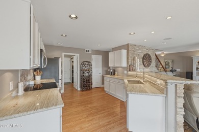 Perched against the iconic Superstition and Dinosaur Mountains on Gold Canyon Golf Resort - Sidewinder in Arizona - for sale on GolfHomes.com, golf home, golf lot