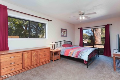 Charming house nestled among mature trees on a quiet street on Canyon Mesa Country Club in Arizona - for sale on GolfHomes.com, golf home, golf lot