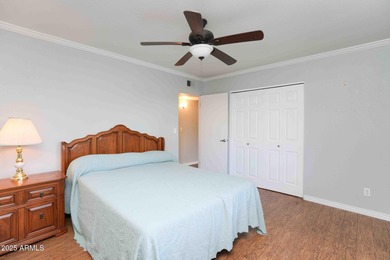 Charming house nestled among mature trees on a quiet street on Canyon Mesa Country Club in Arizona - for sale on GolfHomes.com, golf home, golf lot