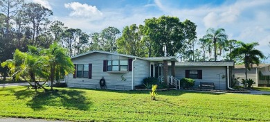 Welcome to this beautifully furnished two-bedroom, two-bath home on Pine Lakes Country Club in Florida - for sale on GolfHomes.com, golf home, golf lot