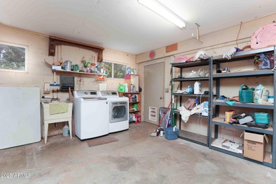 Charming house nestled among mature trees on a quiet street on Canyon Mesa Country Club in Arizona - for sale on GolfHomes.com, golf home, golf lot