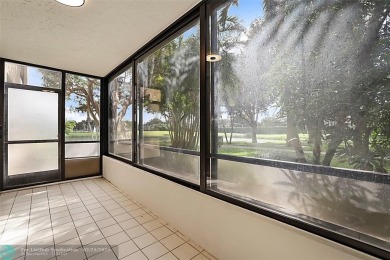 Discover your dream condo at 7186 Promenade Drive, Unit 101, in on Boca Pointe Country Club in Florida - for sale on GolfHomes.com, golf home, golf lot