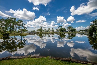 Welcome to this beautifully furnished two-bedroom, two-bath home on Pine Lakes Country Club in Florida - for sale on GolfHomes.com, golf home, golf lot