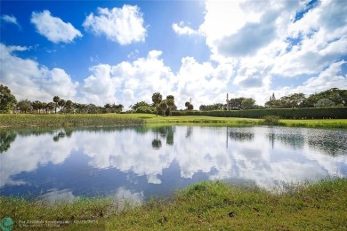 Discover your dream condo at 7186 Promenade Drive, Unit 101, in on Boca Pointe Country Club in Florida - for sale on GolfHomes.com, golf home, golf lot