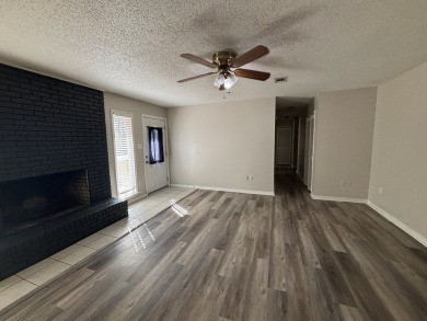 This 3 bedroom home is located in Diamondhead. Wood burning on Diamondhead Country Club in Mississippi - for sale on GolfHomes.com, golf home, golf lot