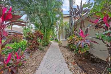 Welcome to this exceptionally renovated 3-bedroom, 2-bathroom on Wycliffe Golf and Country Club in Florida - for sale on GolfHomes.com, golf home, golf lot