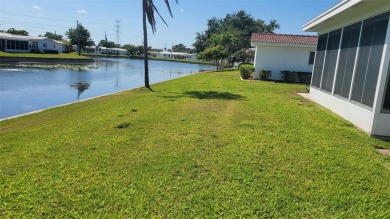 Waterfront GEM! This Mainlands home offers 2 bedrooms, 1 on Mainlands Golf Club in Florida - for sale on GolfHomes.com, golf home, golf lot