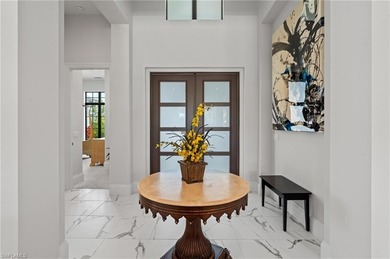 Step into this stunning custom residence by Gulfshore Homes, set on Miromar Lakes Golf Club in Florida - for sale on GolfHomes.com, golf home, golf lot