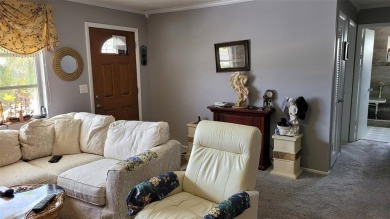 Waterfront GEM! This Mainlands home offers 2 bedrooms, 1 on Mainlands Golf Club in Florida - for sale on GolfHomes.com, golf home, golf lot