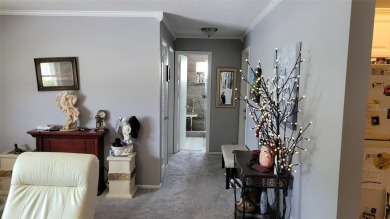 Waterfront GEM! This Mainlands home offers 2 bedrooms, 1 on Mainlands Golf Club in Florida - for sale on GolfHomes.com, golf home, golf lot