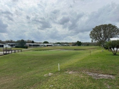 Incredible Opportunity - Resort-like Lifestyle!    This home is on Lake Henry Golf Club in Florida - for sale on GolfHomes.com, golf home, golf lot