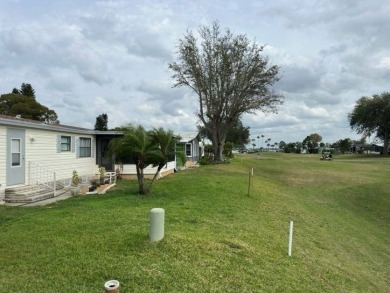 Incredible Opportunity - Resort-like Lifestyle!    This home is on Lake Henry Golf Club in Florida - for sale on GolfHomes.com, golf home, golf lot