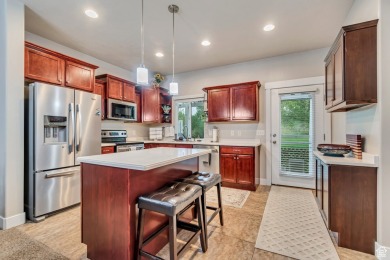 Directly off the kitchen leads to a PRIVATE cover patio, with no on Schneiters Pebble Brook Golf Course in Utah - for sale on GolfHomes.com, golf home, golf lot