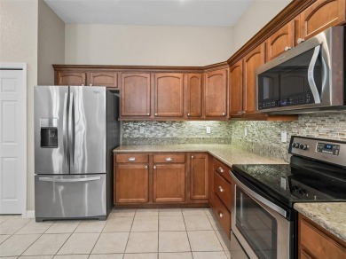 One or more photo(s) has been virtually staged. Stonecrest is a on Stonecrest Golf and Club Club in Florida - for sale on GolfHomes.com, golf home, golf lot