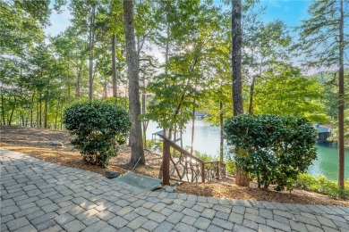 Set along the shores of a calm, emerald-green Lake Keowee Cove on The Cliffs At Keowee Falls in South Carolina - for sale on GolfHomes.com, golf home, golf lot