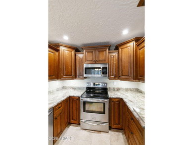 Welcome to this beautifully updated home in the highly desirable on Fountain of the Sun Country Club in Arizona - for sale on GolfHomes.com, golf home, golf lot