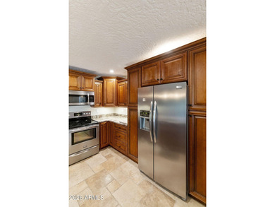 Welcome to this beautifully updated home in the highly desirable on Fountain of the Sun Country Club in Arizona - for sale on GolfHomes.com, golf home, golf lot