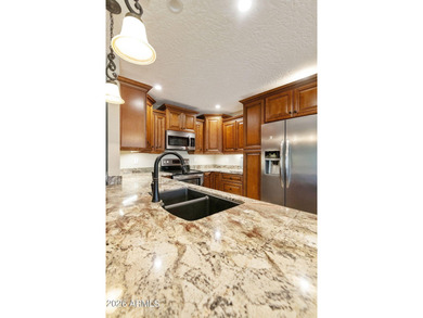 Welcome to this beautifully updated home in the highly desirable on Fountain of the Sun Country Club in Arizona - for sale on GolfHomes.com, golf home, golf lot