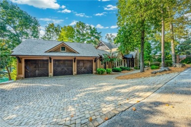 Set along the shores of a calm, emerald-green Lake Keowee Cove on The Cliffs At Keowee Falls in South Carolina - for sale on GolfHomes.com, golf home, golf lot