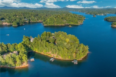 Set along the shores of a calm, emerald-green Lake Keowee Cove on The Cliffs At Keowee Falls in South Carolina - for sale on GolfHomes.com, golf home, golf lot