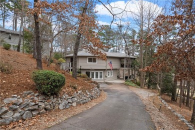 Welcome to 419 Long Reach Drive, a unique, treehouse-style home on Keowee Key Golf and Country Club in South Carolina - for sale on GolfHomes.com, golf home, golf lot