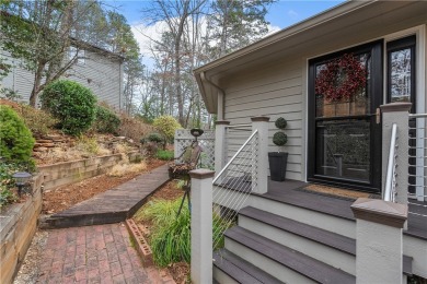 Welcome to 419 Long Reach Drive, a unique, treehouse-style home on Keowee Key Golf and Country Club in South Carolina - for sale on GolfHomes.com, golf home, golf lot