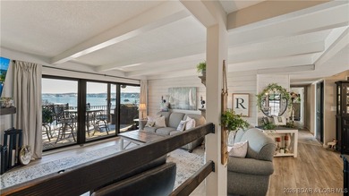 Beautifully updated waterfront condominium with stunning lake on Seasons Ridge At Four Seasons in Missouri - for sale on GolfHomes.com, golf home, golf lot