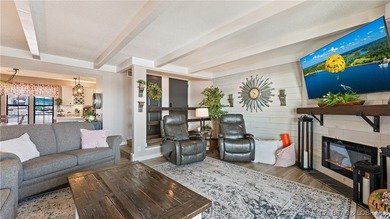 Beautifully updated waterfront condominium with stunning lake on Seasons Ridge At Four Seasons in Missouri - for sale on GolfHomes.com, golf home, golf lot