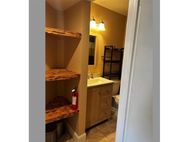 THIS cozy 1-bedroom, 1-bathroom condo offers 675 sq ft of modern on Ventura Country Club in Florida - for sale on GolfHomes.com, golf home, golf lot