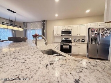 Welcome to your dream home! This exquisitely designed 5-bedroom on Pocono Farms Country Club in Pennsylvania - for sale on GolfHomes.com, golf home, golf lot