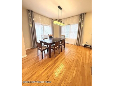 Welcome to your dream home! This exquisitely designed 5-bedroom on Pocono Farms Country Club in Pennsylvania - for sale on GolfHomes.com, golf home, golf lot