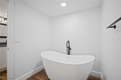 This spacious first-floor end-unit condominium has been on The Forest Country Club in Florida - for sale on GolfHomes.com, golf home, golf lot