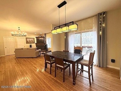 Welcome to your dream home! This exquisitely designed 5-bedroom on Pocono Farms Country Club in Pennsylvania - for sale on GolfHomes.com, golf home, golf lot