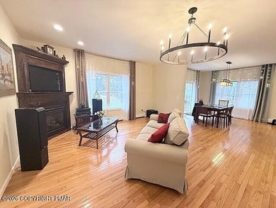 Welcome to your dream home! This exquisitely designed 5-bedroom on Pocono Farms Country Club in Pennsylvania - for sale on GolfHomes.com, golf home, golf lot