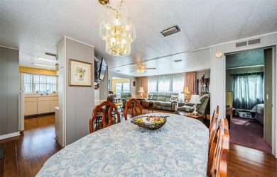 Come view this beautifully furnished two-bedroom, two-bath with on Palm Hill Golf Club in Florida - for sale on GolfHomes.com, golf home, golf lot