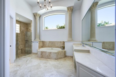 Live luxuriously on the 16th green of the Arnold Palmer on Frenchmans Reserve in Florida - for sale on GolfHomes.com, golf home, golf lot