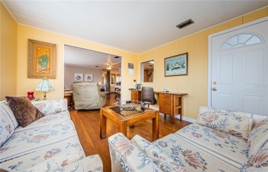 Come view this beautifully furnished two-bedroom, two-bath with on Palm Hill Golf Club in Florida - for sale on GolfHomes.com, golf home, golf lot