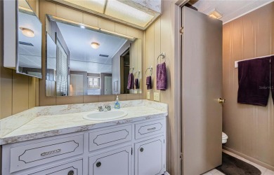 Come view this beautifully furnished two-bedroom, two-bath with on Palm Hill Golf Club in Florida - for sale on GolfHomes.com, golf home, golf lot