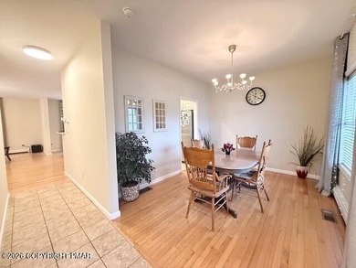 Welcome to your dream home! This exquisitely designed 5-bedroom on Pocono Farms Country Club in Pennsylvania - for sale on GolfHomes.com, golf home, golf lot