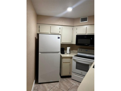THIS cozy 1-bedroom, 1-bathroom condo offers 675 sq ft of modern on Ventura Country Club in Florida - for sale on GolfHomes.com, golf home, golf lot