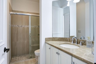 Live luxuriously on the 16th green of the Arnold Palmer on Frenchmans Reserve in Florida - for sale on GolfHomes.com, golf home, golf lot