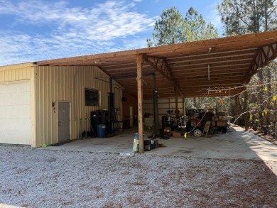 This stunning property, situated on 22 acres in the Lowcountry on Penny Branch Club in South Carolina - for sale on GolfHomes.com, golf home, golf lot