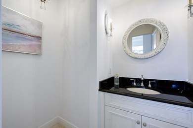 Live luxuriously on the 16th green of the Arnold Palmer on Frenchmans Reserve in Florida - for sale on GolfHomes.com, golf home, golf lot