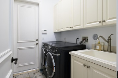 Live luxuriously on the 16th green of the Arnold Palmer on Frenchmans Reserve in Florida - for sale on GolfHomes.com, golf home, golf lot